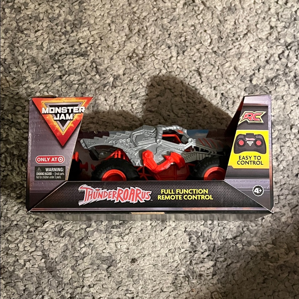 Remote Control Tunderroars Truck with Red and Gray Design